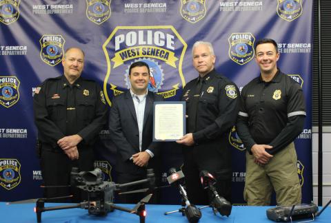 Assistant Chief Leitzel, Legislator Lorigo, Chief Edward Baker, and Lt. Pelow