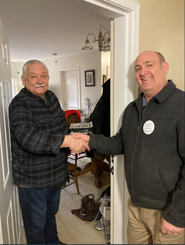 Erie County Legislator Chris Greene delivers meals to Joseph with FeedMore WNY