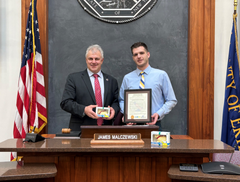 Legislator Jim Malczewski honors Adam Cichocki and Camellia meats for continuing the butter lamb Easter tradition