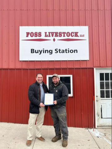 Erie County Legislator Frank Todaro presents a proclamation to Nick Foss to commemorate Ag Week and National Agriculture Month