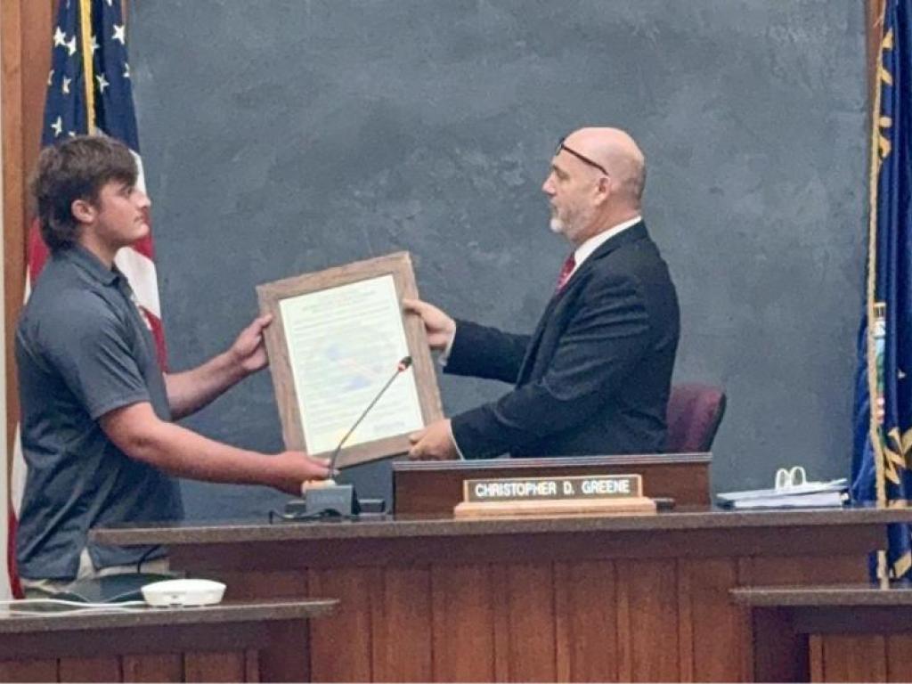 Legislator Christopher Greene and Erie County Citizen of the Month, Brody Kaufman, a young man who saved the life of a kayaker in Florida during his Spring Break this April