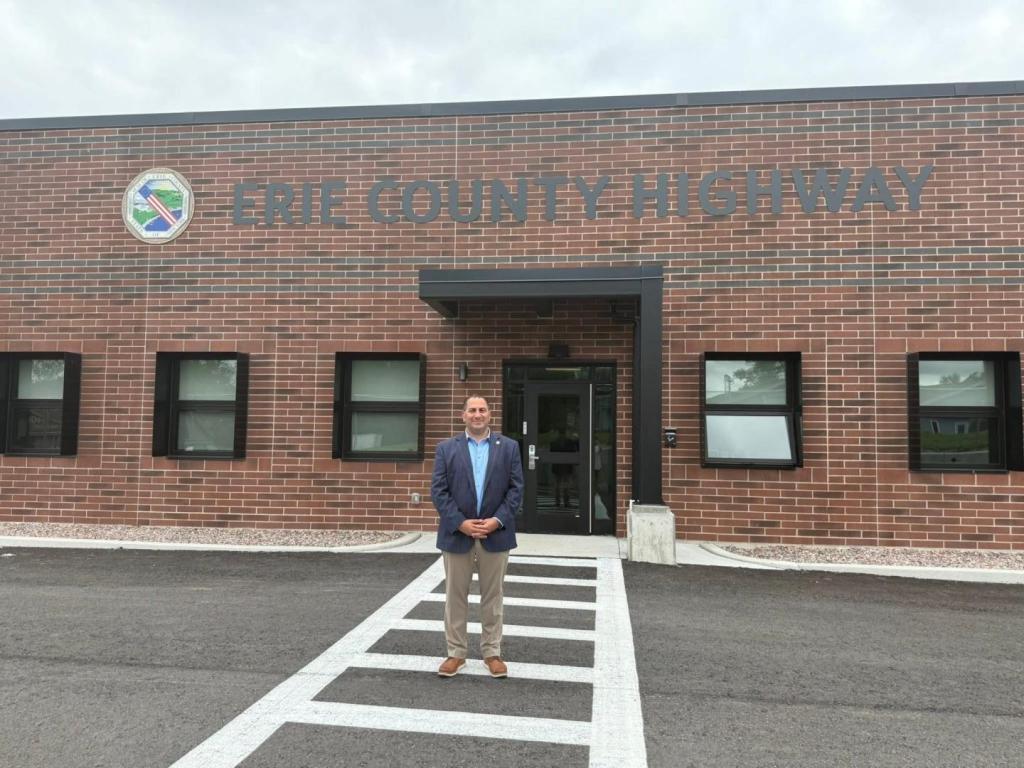 Legislator Todaro helps cut the ribbon for Erie County's new highway barn in Lancaster