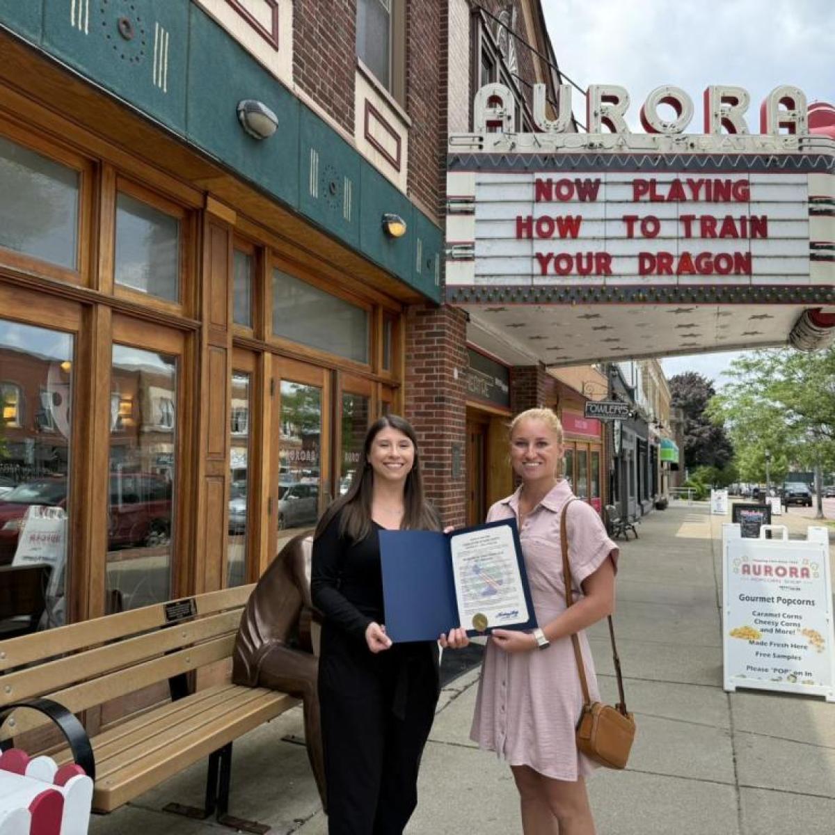 Erie County Legislator Lindsay Lorigo presented a proclamation to the Aurora Theatre and Popcorn Shop on their 100th anniversary, recognizing their enduring legacy as an icon of East Aurora's Main Street.