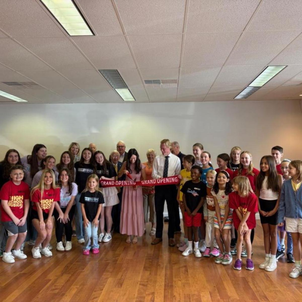 Legislator John Mills joins Annalise Casciano for the grand opening of the Room Theatre Company's new location