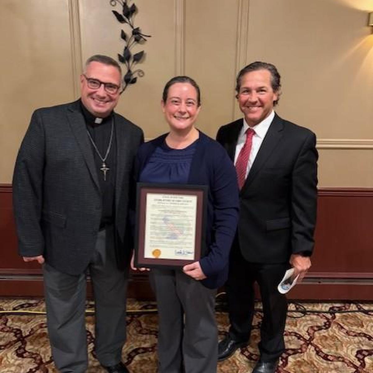 A proclamation from Legislator Frank Todaro is presented to St. John Lutheran Church in Depew celebrating their 130th anniversary 
