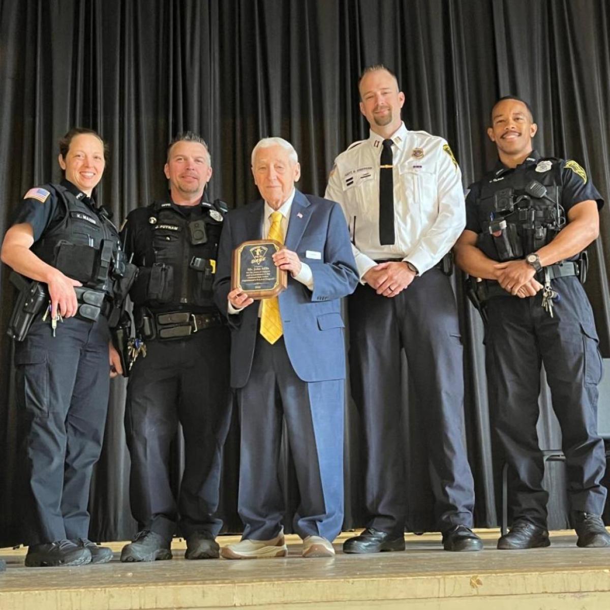 Legislator John Mills recognized for his long-time support of DARE Program in Orchard Park Schools.