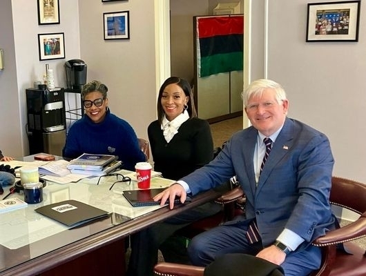 Clerk Mickey Kearns and the ZOMBIES Initiative team with Councilwoman Leah Halton-Pope discussing housing and vacant properties.