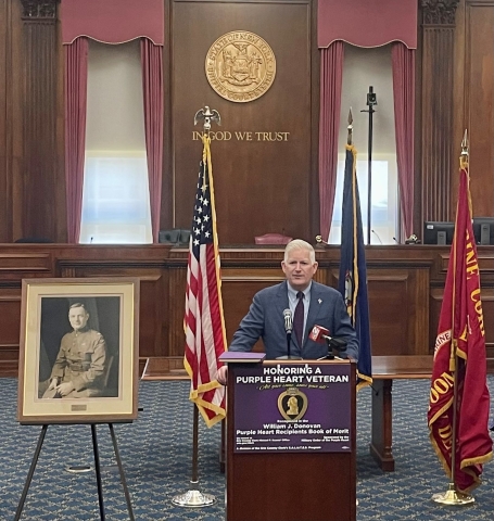 Erie County Clerk Michael P. Kearns pays tribute to 35 Purple Heart Recipients being added to the  William J. Donovan Purple Heart Book of Merit for 2024 during a Dedication and Flag Raising Ceremony that  included honorees, family members, veteran organizations, and the Military Order of the Purple Heart, Chapters 187 and 264.