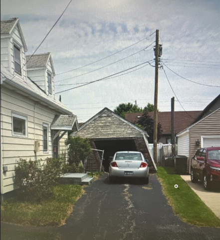 Dilapidated garage, located on Dean Road in the Village of Depew, was demolished after being reported to the Erie County Clerk's ZOMBIE Initiative