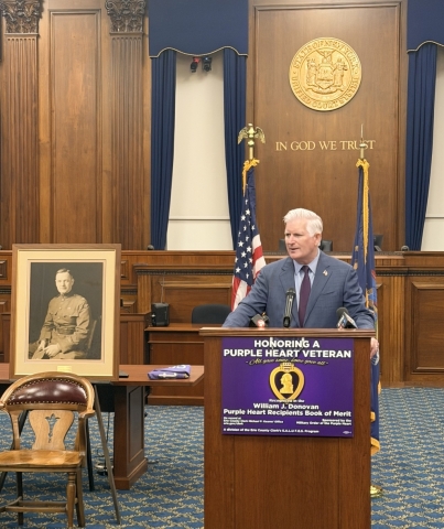 Erie County Clerk Michael P. Kearns pays tribute to 48 Purple Heart Recipients being added to the  William J. Donovan Purple Heart Book of Merit for 2026 during a Dedication and Flag Raising Ceremony that  included honorees, family members, veteran organizations, and the Military Order of the Purple Heart, Chapters 187 and 264.