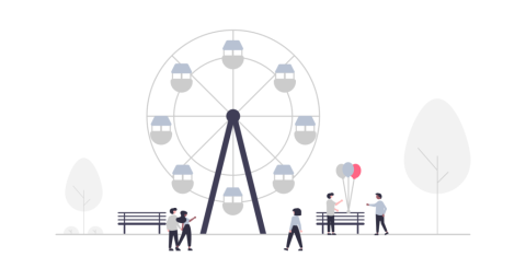 large ferris wheel behind people walking at a fair