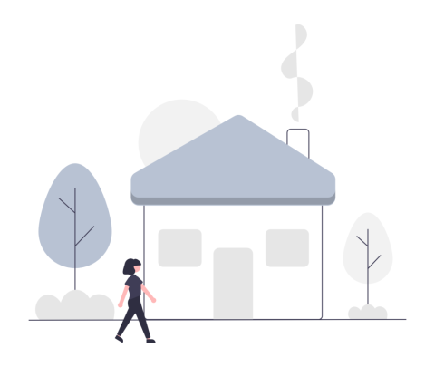 person walking past a house with smoke coming from the chimney